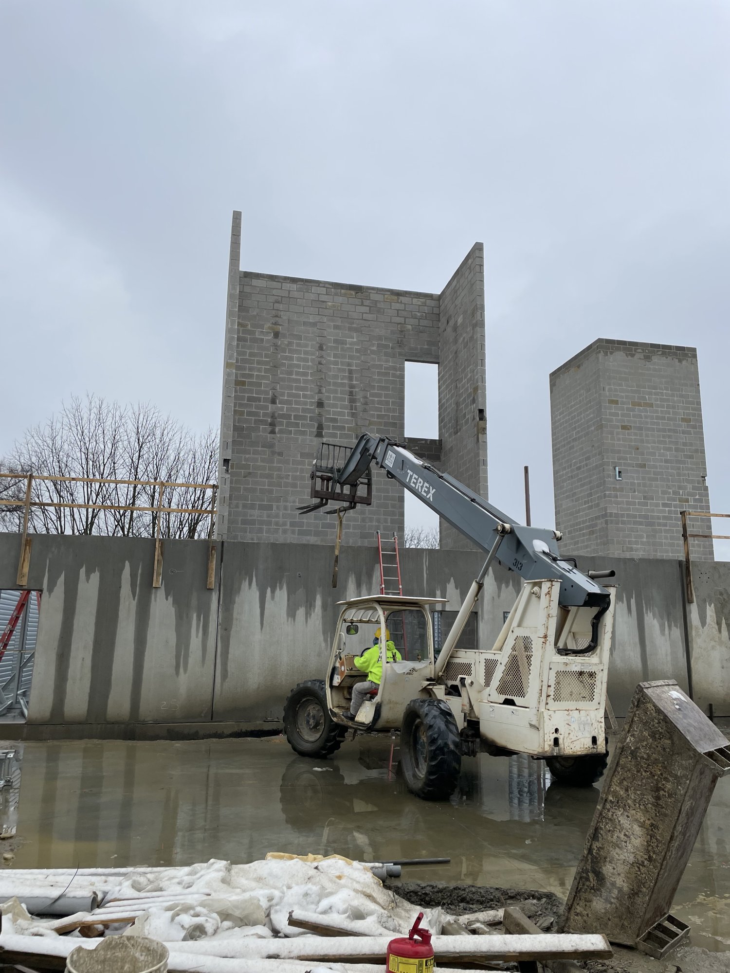 In-progress CMU block masonry work by Olympic Services Inc.