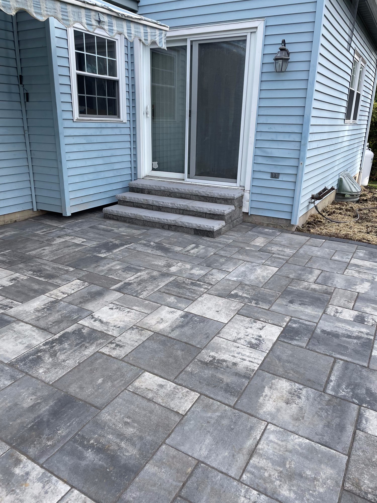 Brick and stone paving installation by Olympic Services Inc.