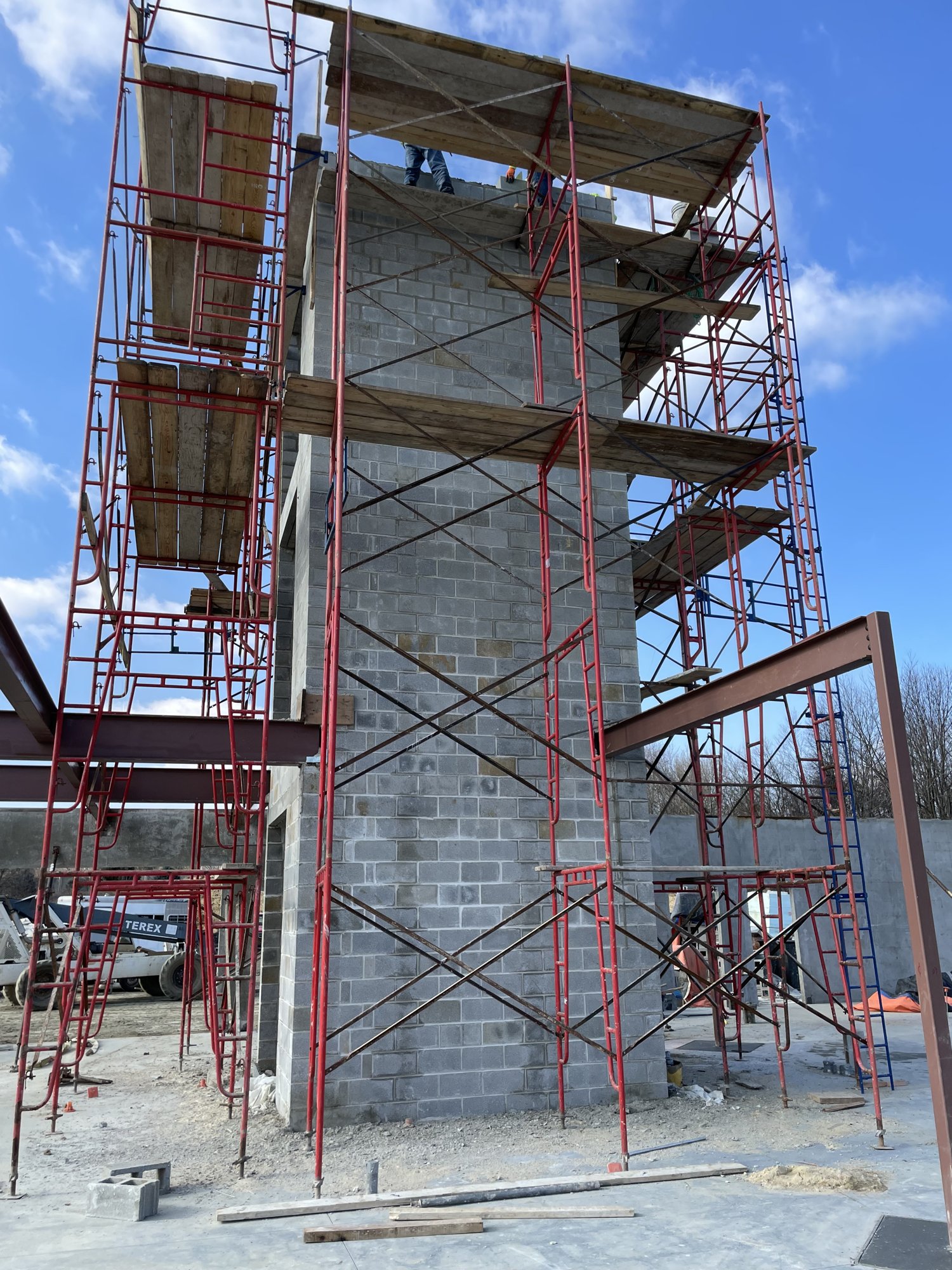 Structural concrete and steel masonry scope by Olympic Services Inc.